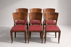 Sei sedie da pranzo francesi in stile Art Déco, in noce e pelle rossa, anni ’40