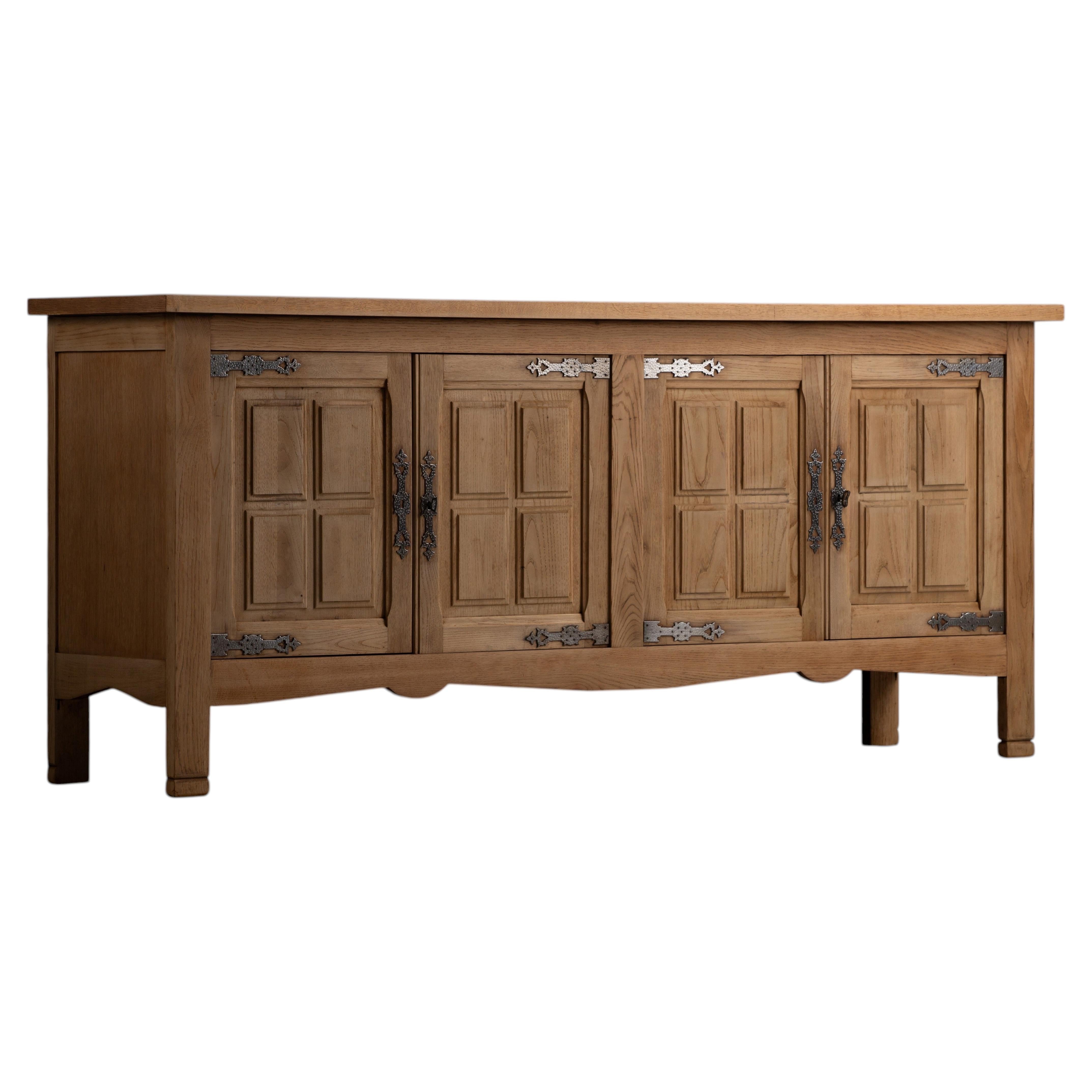 Spanish Oak Sideboard with Raised Square Panels and Iron Straps, 1950s For Sale