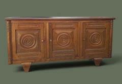 In the Manner of Charles Dudouyt, Oak Sideboard, Carved Discs, France, 1940s