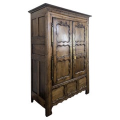 Armoire provinciale française à deux portes, en merisier sculpté, datée de 1883