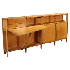 Italian Modernist Cupboard with Fold-Out Desk, Maple, 1960s. This Italian sideb