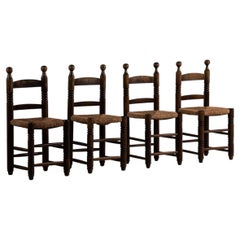 Set of Four Brutalist Chairs in Oak with Rush Seats, France, 1950s