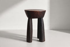 Sgabello africano Senufo, legno massiccio intagliato, Costa d’Avorio, metà del XX secolo
