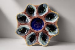 Plato francés de majólica con forma de ostra, loza esmaltada, motivos de peces, década de 1890