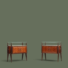 Italian Sculptural Nightstands, Rosewood, Glass and Brass, 1950s. This pair of
