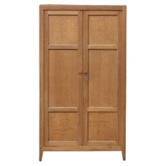 French Reconstruction Oak Two-Door Armoire, Paneled Doors, 1940s. This armoire