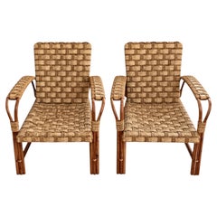 Dans le style d'Audoux Minet, paire de fauteuils, rotin et corde, France, années 1950