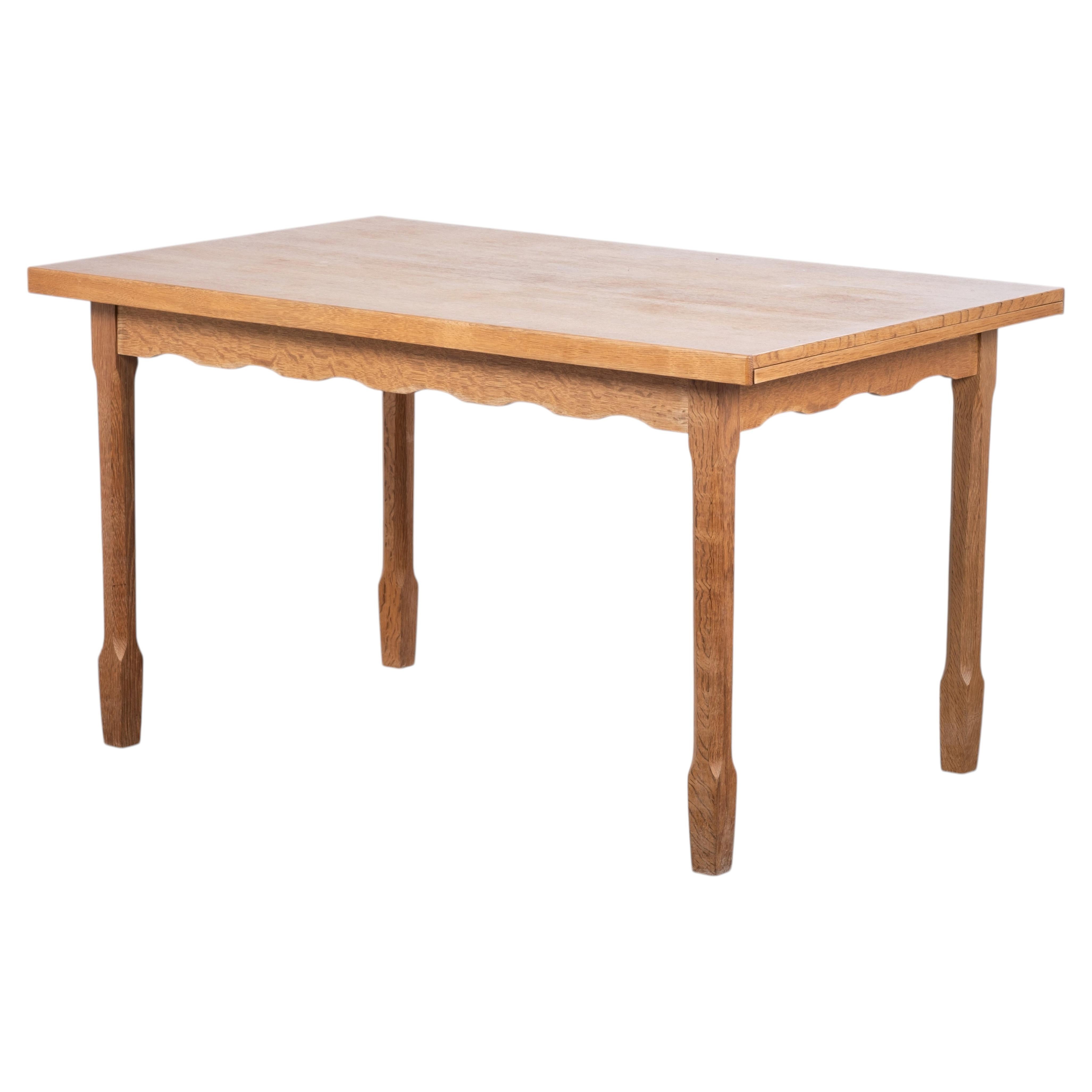 Brutalist Oak Dining Table Attributed to Henning Kjærnulf, 1960s For Sale