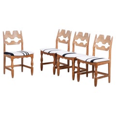 Title: Set of 4 Original Henning Kjærnulf “Razor Blade” Oak Dining Chairs, 1960s