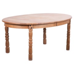 Brutalist Oval Oak Dining Table from Henning Kjærnulf, Denmark, 1960s