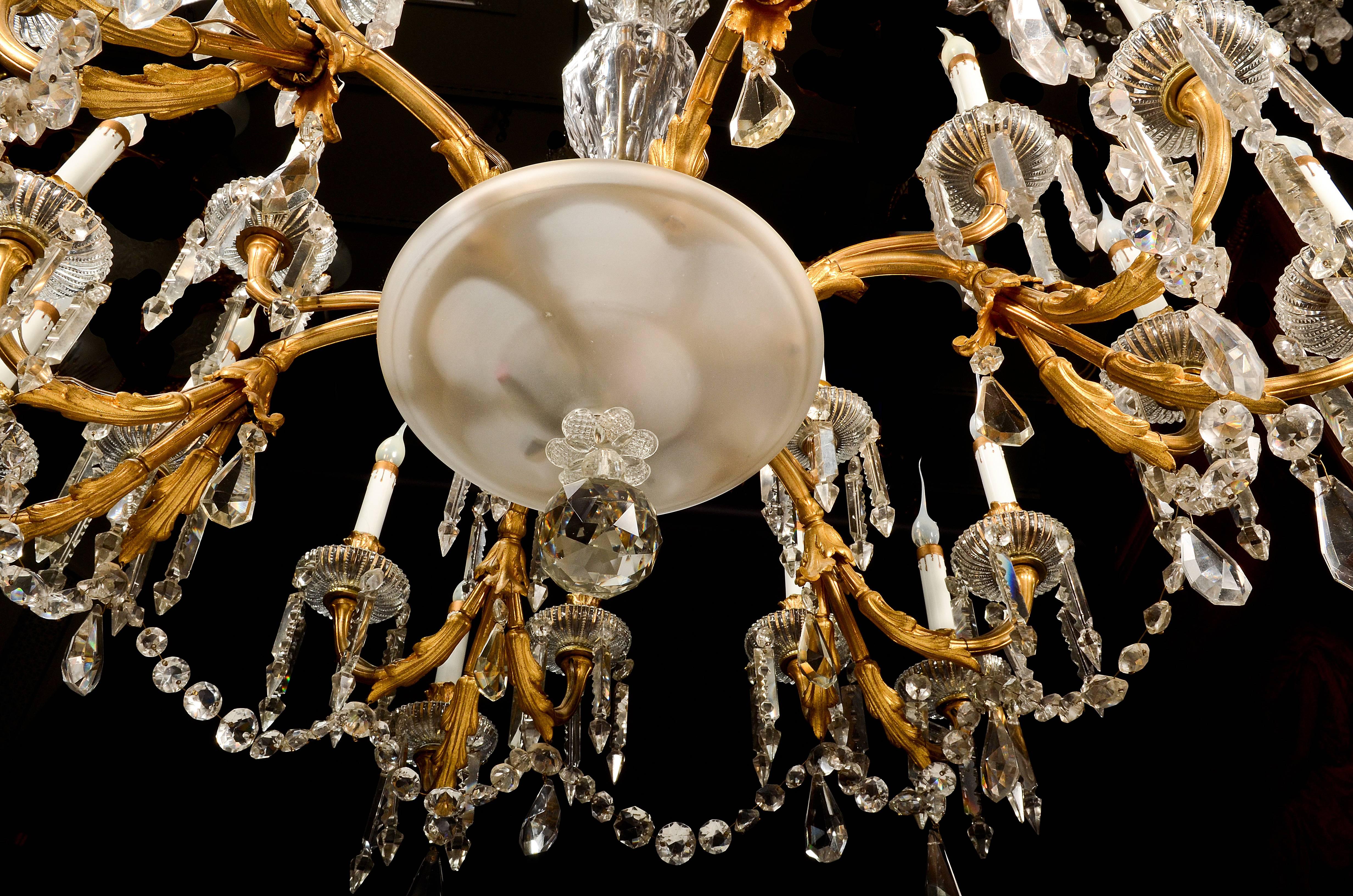 19th Century Antique French Louis XVI Style Gilt Bronze and Crystal 24-Arm Chandelier For Sale