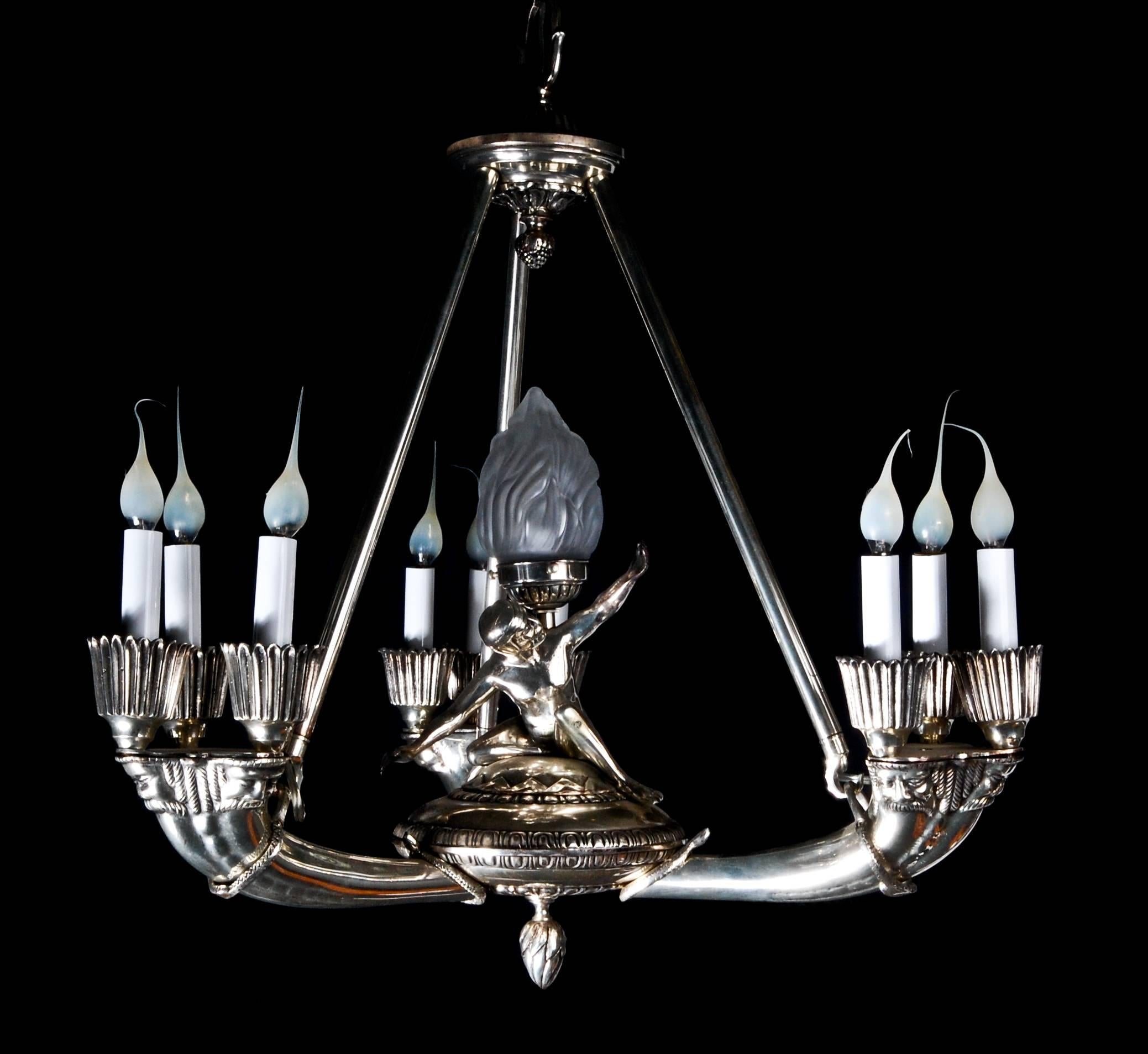 Fine antique french art deco style silvered bronze figural chandelier with a central figure and arms embellished with figural masks.