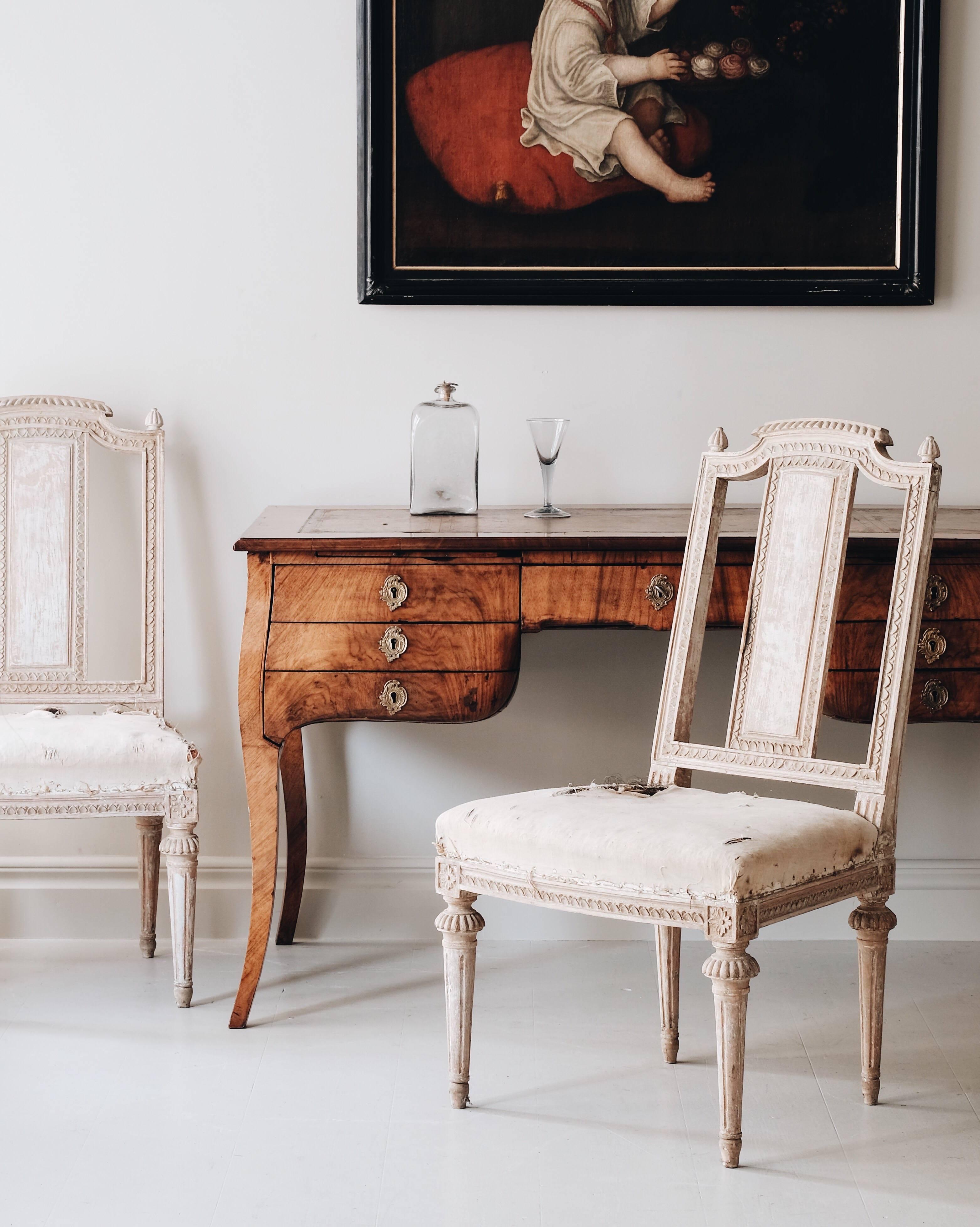 Fine and most unusual pair of 18th century Gustavian armchairs with its original padding left and in original color. Great carvings and proportions, circa 1790, Stockholm, Sweden.

Upholster it yourself or let us do it in a washed natural raw