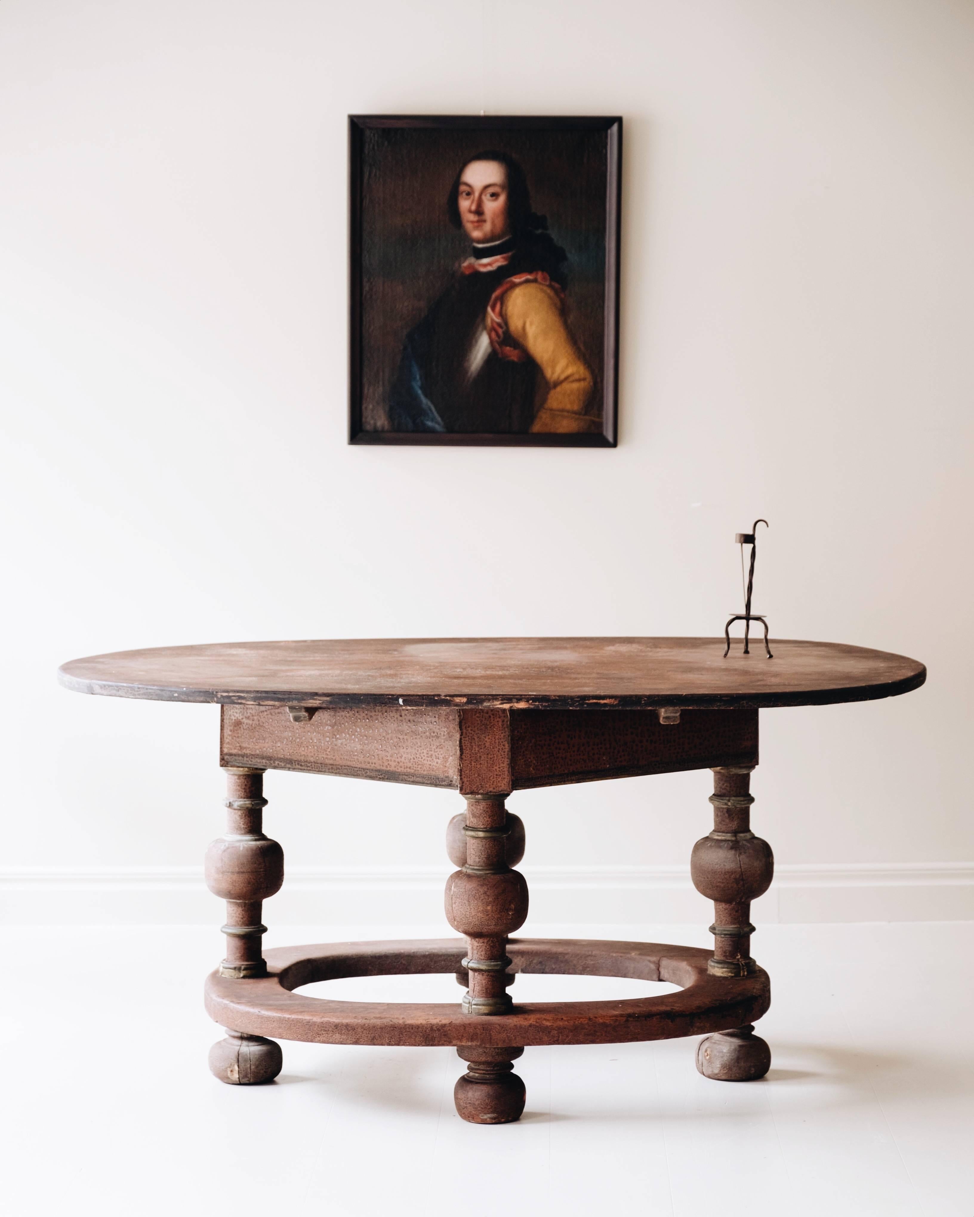 An unusual and robust 18th century Baroque table in original color, Sweden, circa 1730.