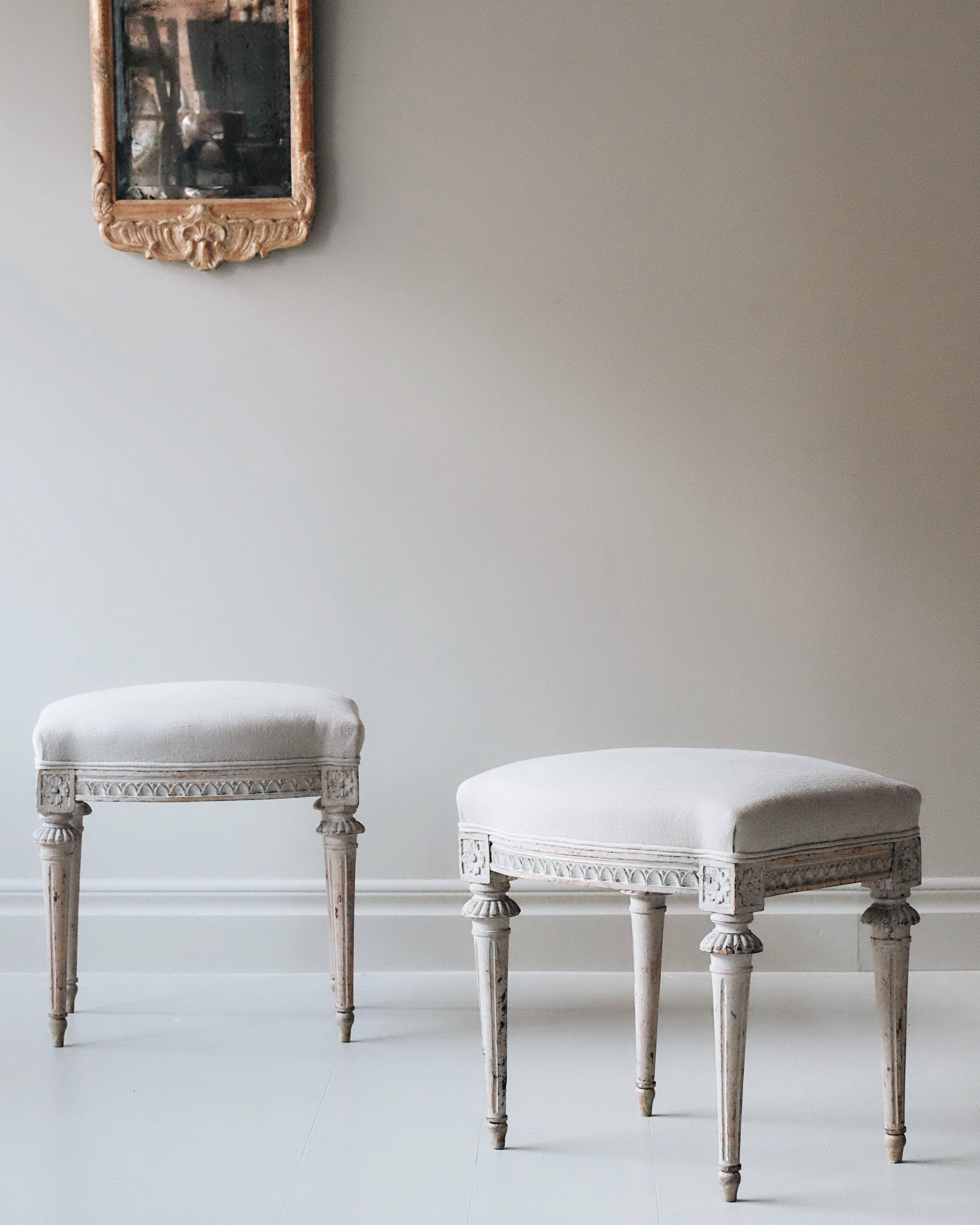 Exceptional and elegant pair of early 19th century Gustavian stools in original color, marked with the Stockholm chair makers guild and signed by master chair maker Ephraim Sthal. ca 1810, Sweden.

Ephraim Sthal (Master 1794-1820): One of the most