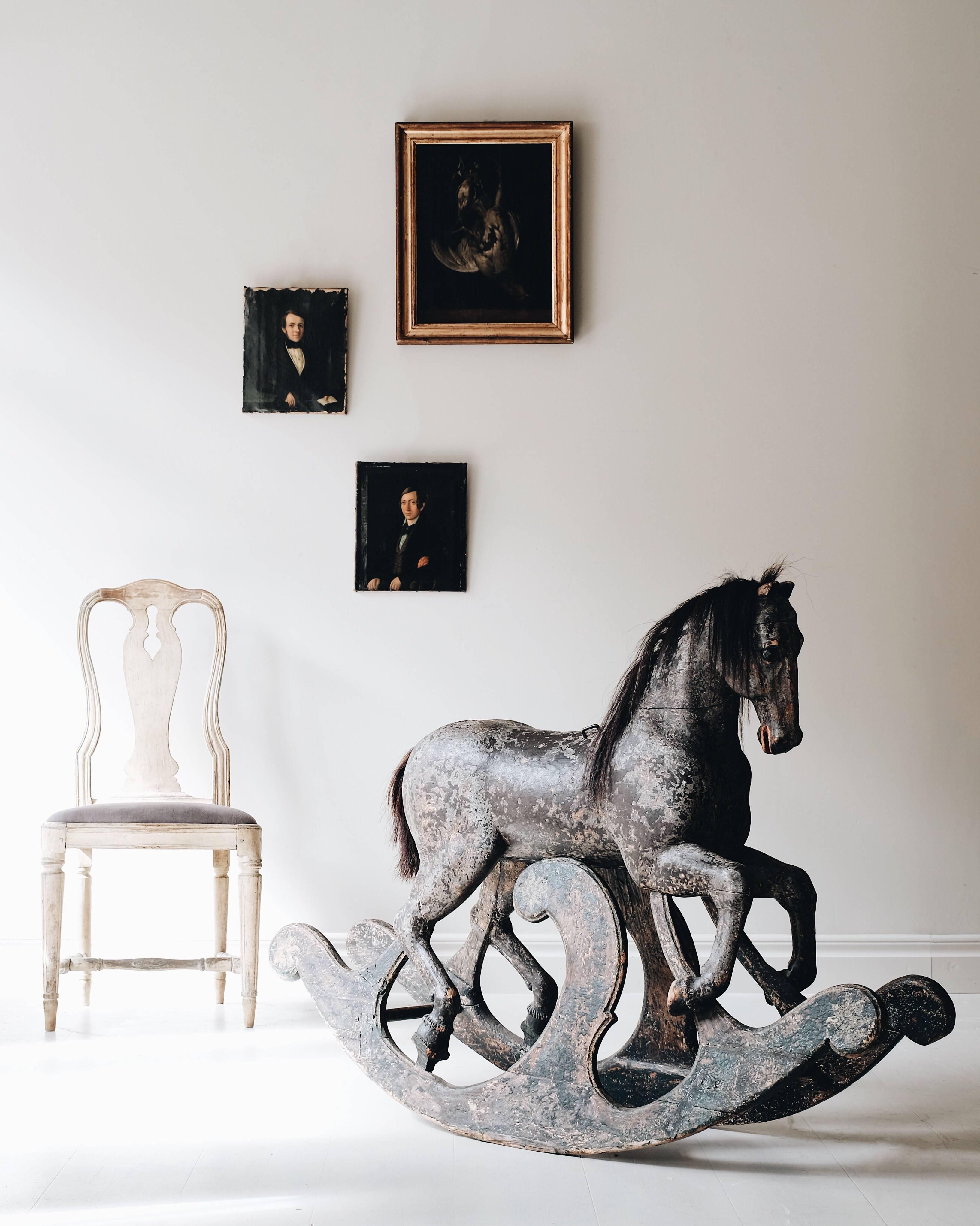 Exceptional 18th century Swedish Rococo wooden rocking horse in original color with great proportions and detail. Original horse hair on mane and tail, circa 1750, Sweden.