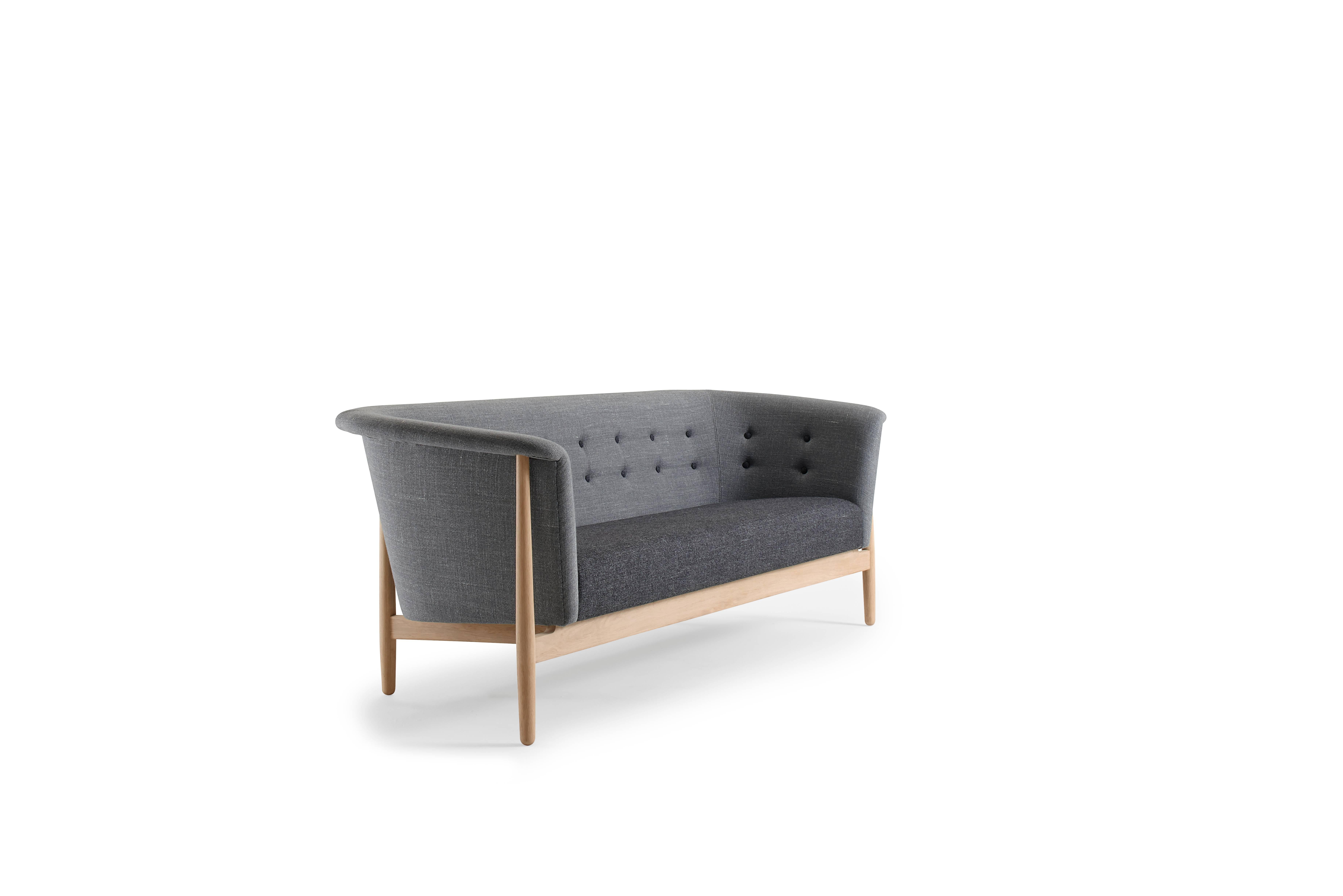 Nanna Ditzel (1923-2005). Vita couch in oak, upholstered in two shades of grey fabric from Svensson with grey buttons. Designed in 1958. Manufactured by GETAMA in Denmark. It is possible to choose any color and type of fabric for the couch. Seat
