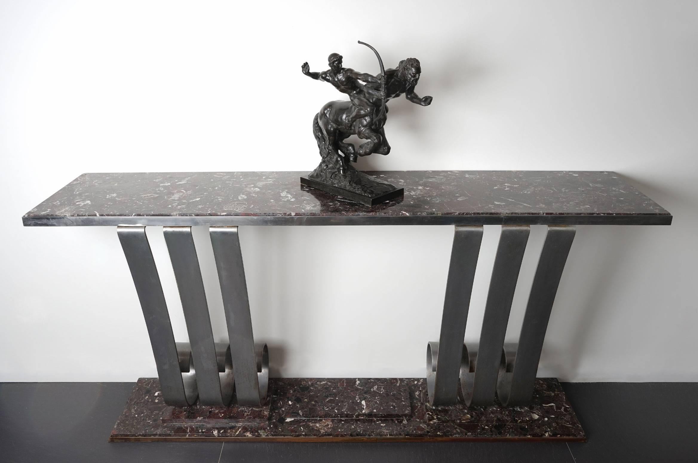 Exceptional 1940s Art Deco console by Raymond Subes
Marble base 
1940s
Dimensions: 90 x 180 x 40 cm

Raymond Subes
(1891-1970)
Raymond Subes is one of the most renowned French metalworkers of the Art Deco period. His notoriety as an