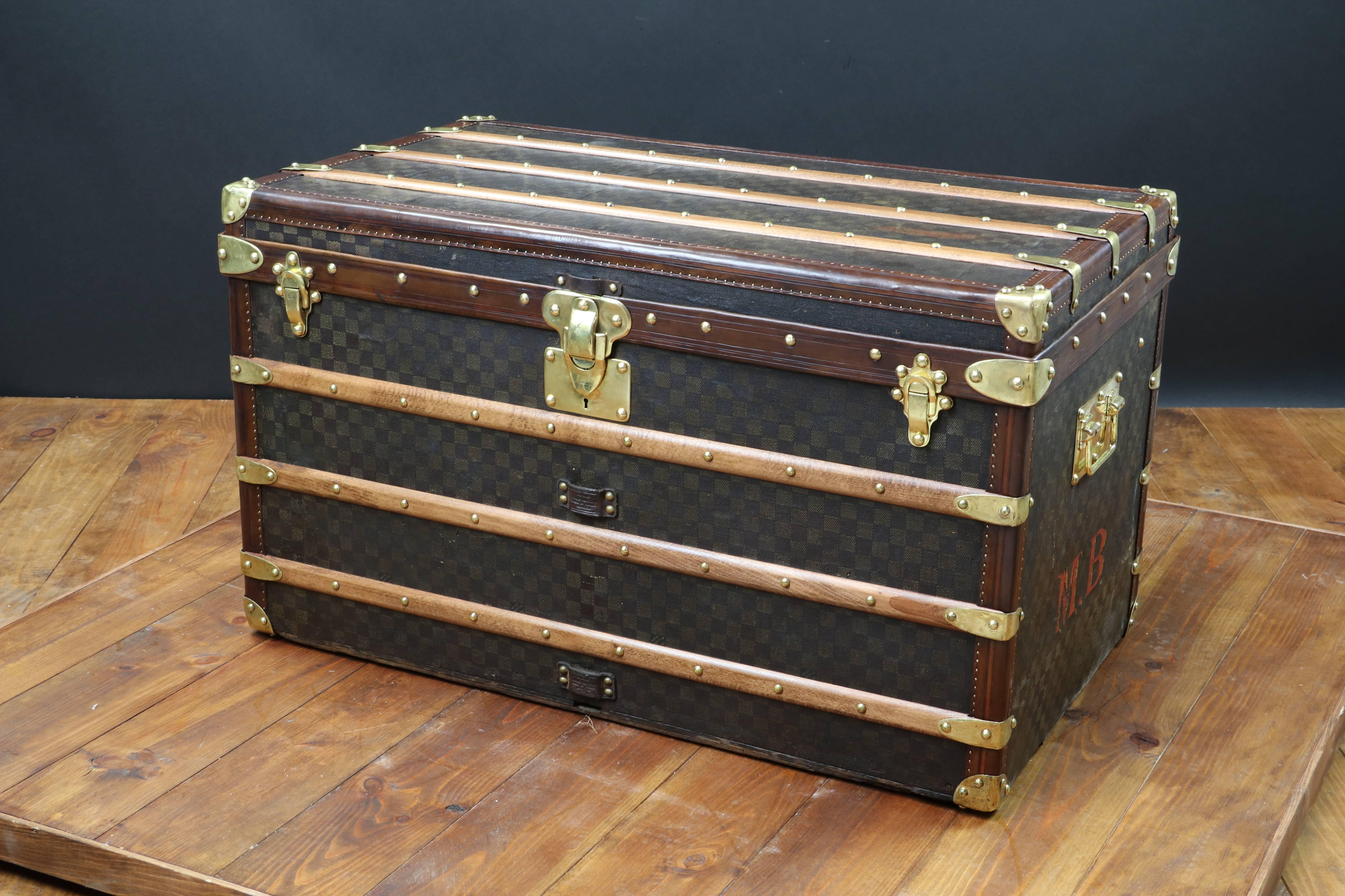 Louis Vuitton Damier canvas trunk.

We have restore this trunk.

All leather border are rebuild.

We have also rebuild two handels and one hasp.

New perfect inside.

Perfect size for a nice coffee table.

Size in cm 90 wide x 52 height