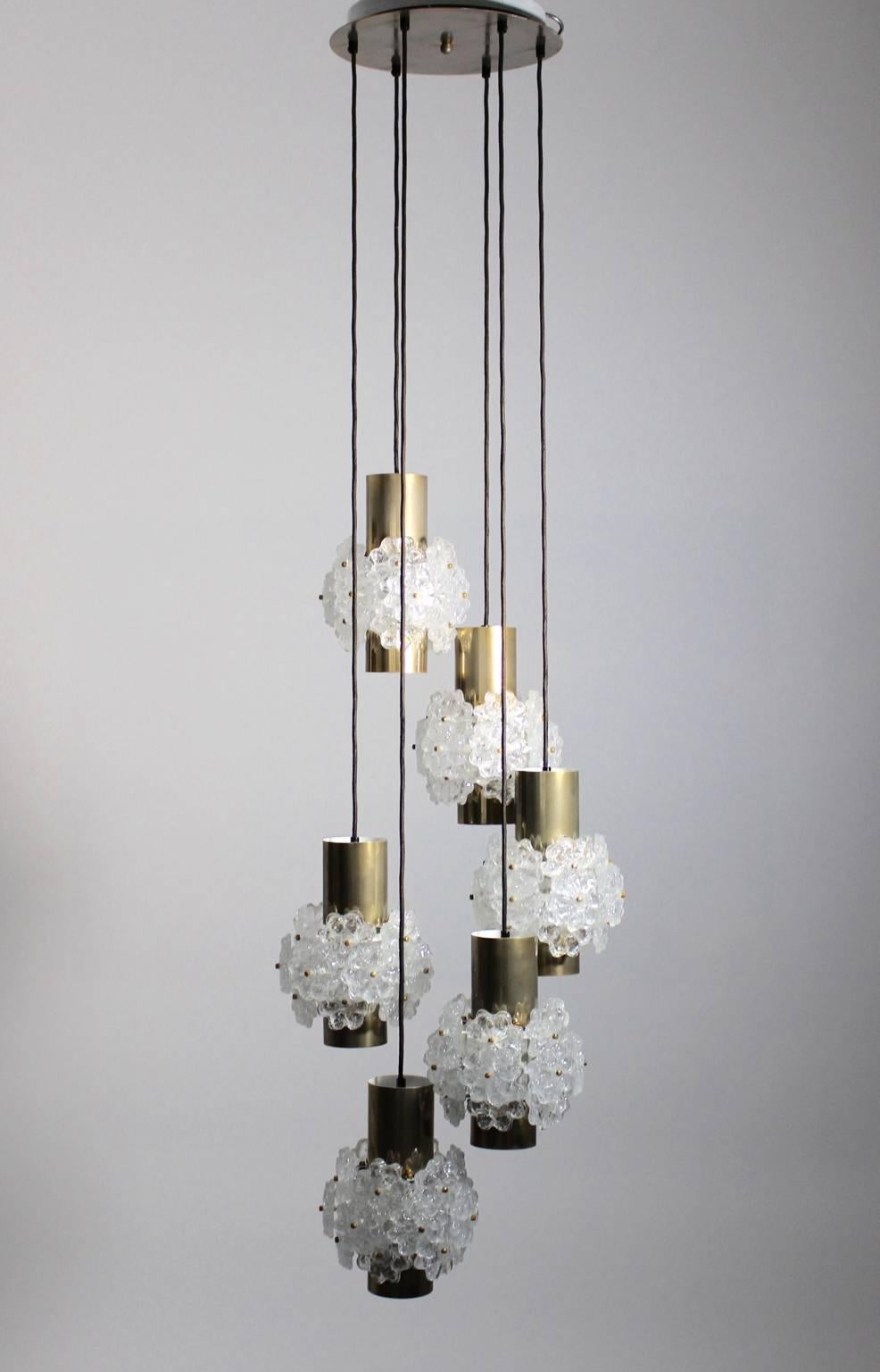 Charming Mid-Century Modern brassed chandelier with six hanging lamps, each decorated with nineteen lucite flowers.
The chandelier features six sockets E 27 and shows a a beautiful patina.
Very good vintage condition
approx. measures:
Diameter 47