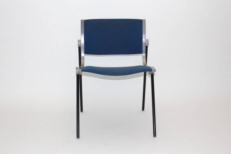 Mid Century Modern vintage chair or side chair or office chair from aluminum by Vaghi circa 1960 Italy.
The chair consists of aluminum frame, while the legs are plastic coated. The seat and back is covered with original fabric in a beautiful blue