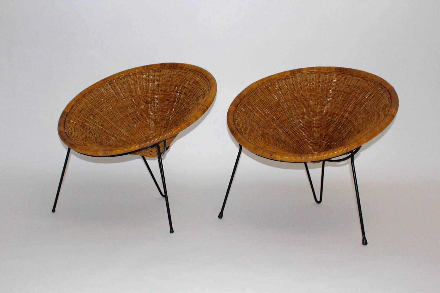 Mid Century Modern pair of rattan or wicker vintage garden chairs or club chairs, which was designed by Roberto Mango, Italy, 1950s.
Roberto Mango ( 1920 - 2003 ) Italian architect
Roberto Mango began his career in 1946 with his graduation in