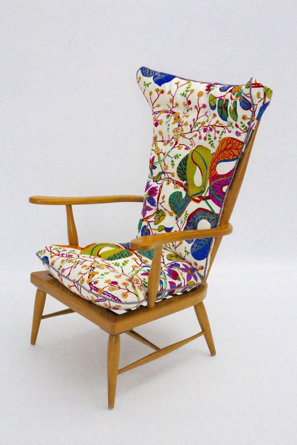 Art deco vintage armchair or Windsor chair from beech designed by Anna Lülja Praun circa 1952.
The beech stained similar to cherry in a honey brown wooden tone and hand polished.
Beautiful loose cushions covered with Josef Frank Design textile