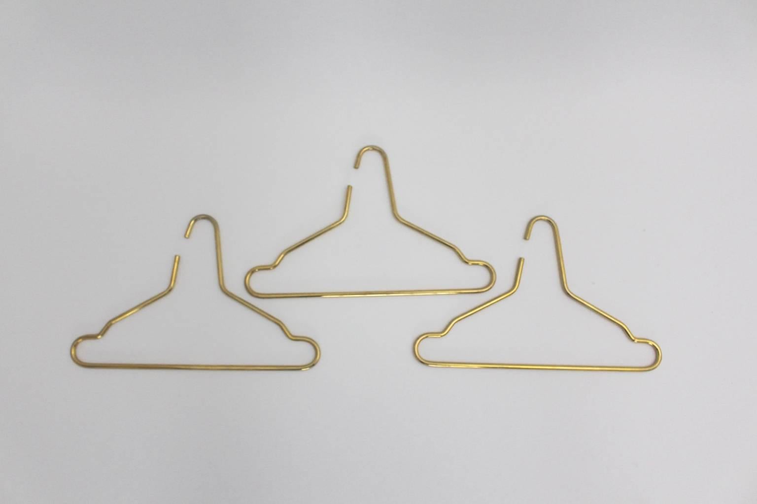 A modern vintage set of three brass hangers, which was designed and manufactured in Austria 1970s.
The brass hanger set is in very good condition with beautiful patina.
