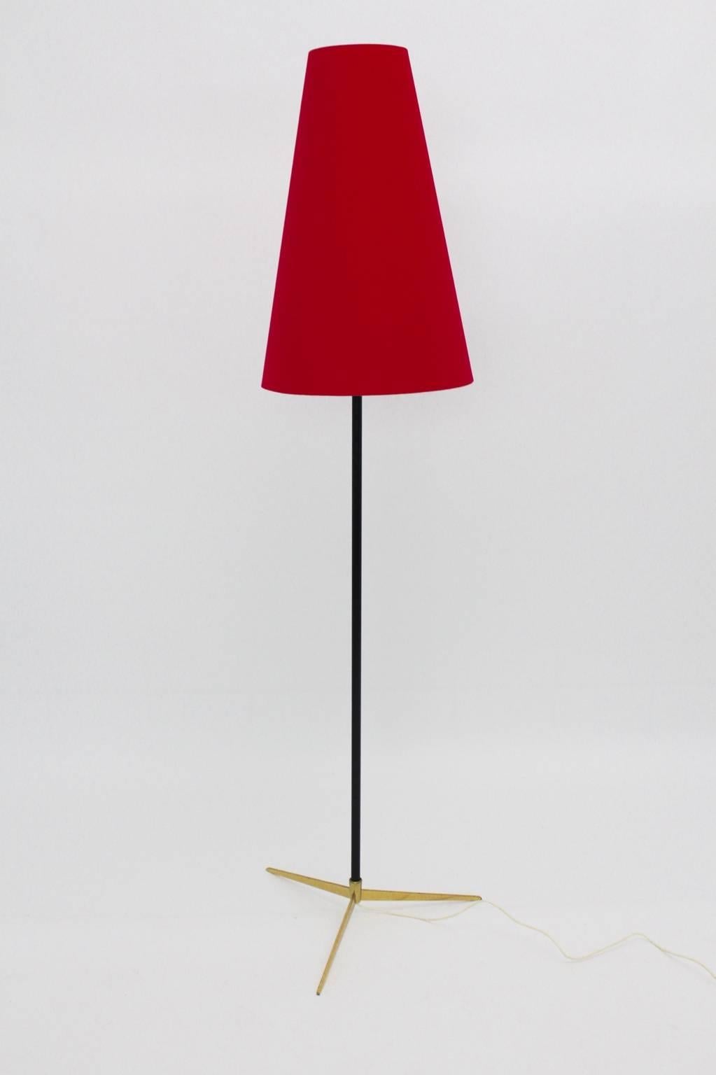 Mid century modern floor lamp model Micheline no. 2092 was designed and executed by J.T. Kalmar, Vienna, Austria, 1960.
The floor lamp shows brass foot and a black lacquered tube steel stem.
Also the renewed lamp shade is covered with a red
