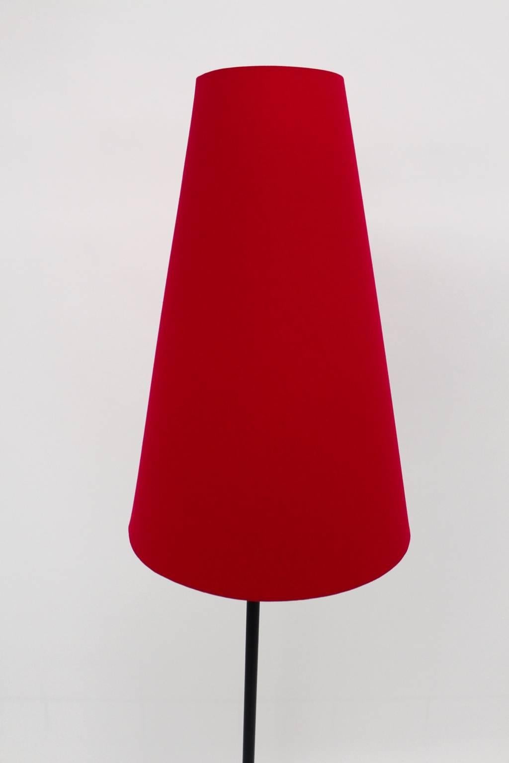 red tripod floor lamp