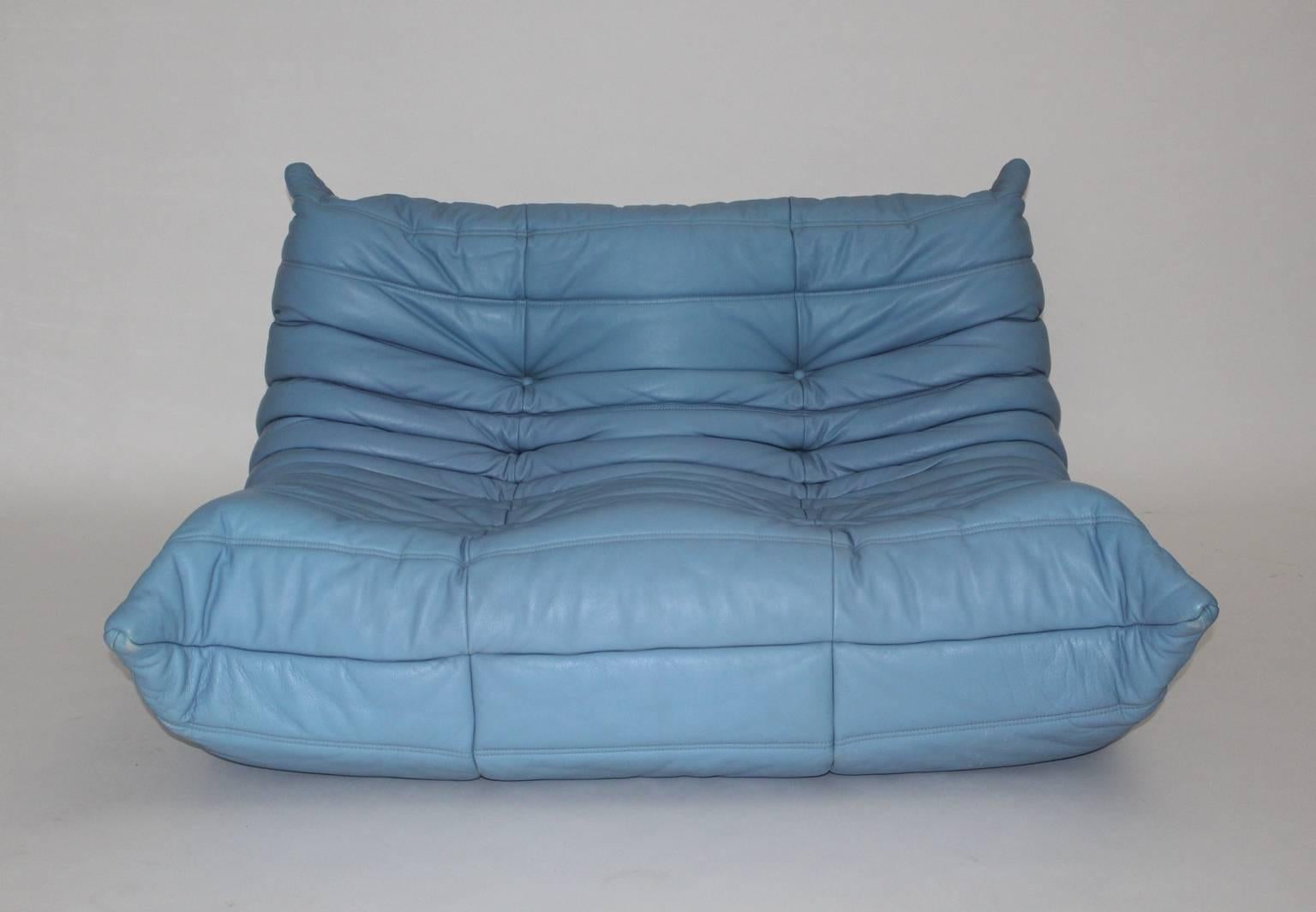 This light-blue sofa Togo was designed by Michel Ducaroy 1974, France and executed by Ligne Roset, France in the 1980s.
This loveseat is upholstered with high-quality light heaven blue leather and is in very good original condition.

Also the Sofa