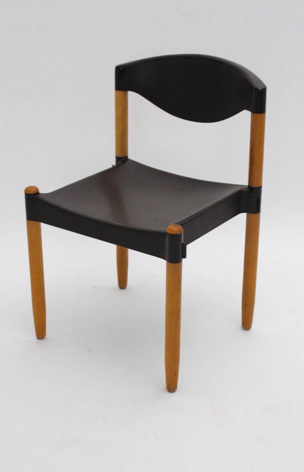 A set of eight mid century modern dining chairs named Strax, which were designed by Hartmut Lohmeyer, 1970s.
The special feature of these chairs is, that you can stack them and connect them with an integrated plastic-hook. 
Executed by Casala, 1981,