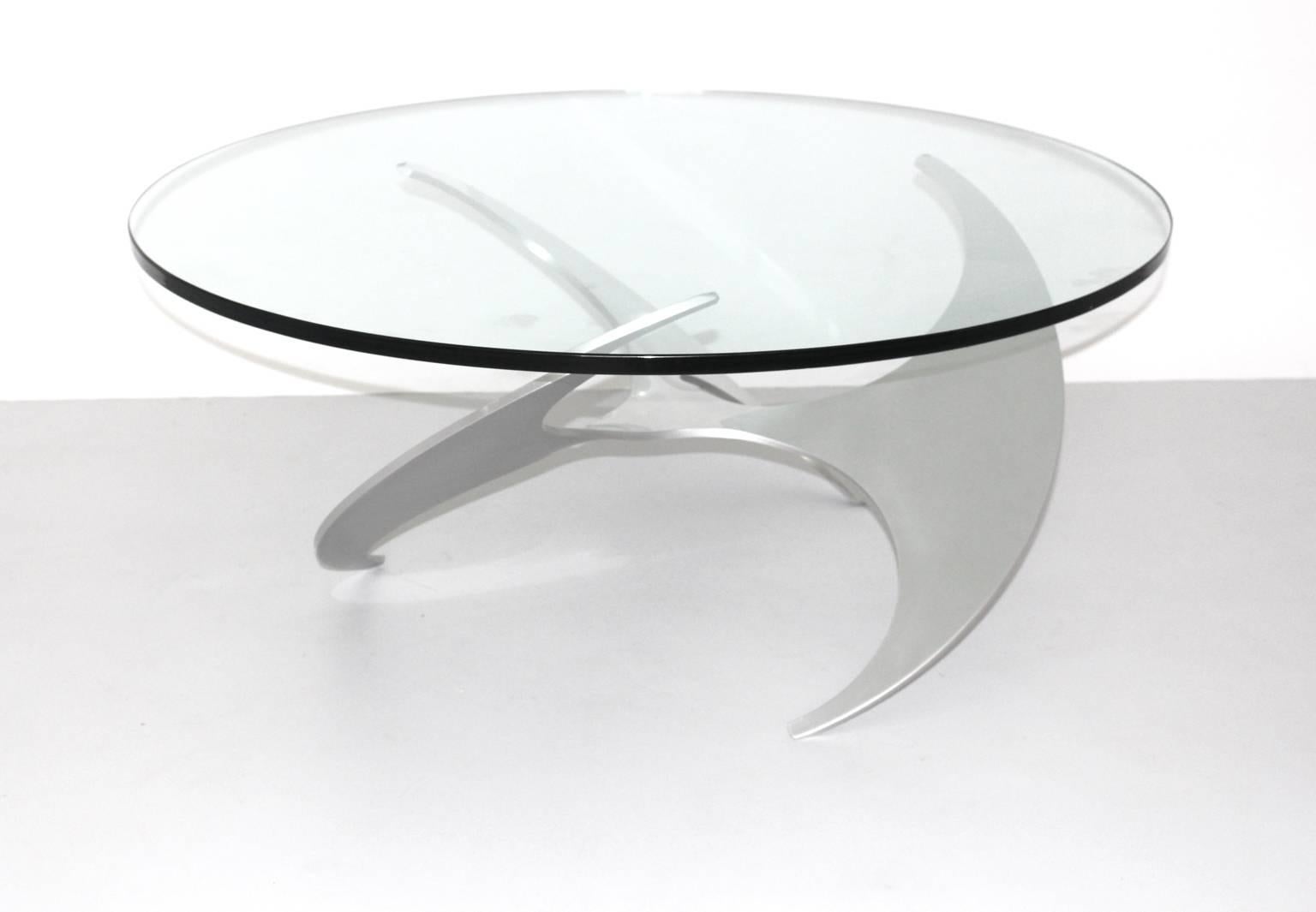 Mid century modern vintage coffee table or side table made from polished aluminium.
Knut Hesterberg designed this coffee table circa 1964 and the piece was produced by Ronald Schmitt, Germany.

Furthermore the coffee table features a fabulous