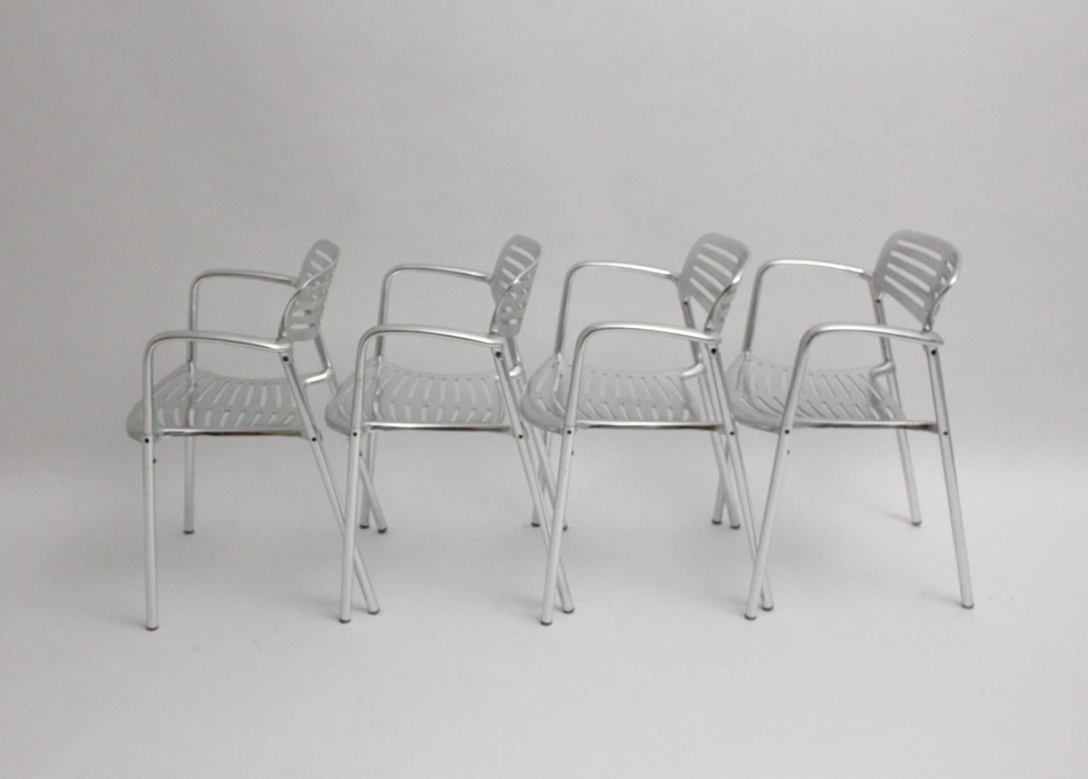Modern set of 4 chairs or garden chairs or dining chairs from aluminum by Jorge Pensi 1986-1988, Spain.
The name Toledo is given from a fortress, which obtain impregnable. 
Produced by Amat 3
These chairs comprise the use for indoor and outdoor,