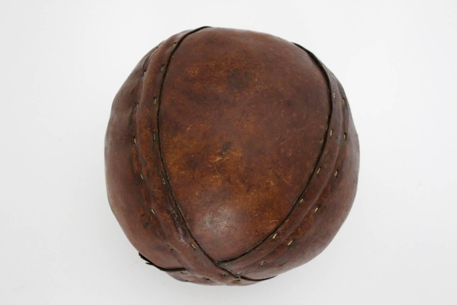Art Deco vintage ball from stitched leather, 1920s with beautiful details like stitched leather parts and a beautiful leather patina.

The original condition of the leather punchball is very good with signs of age use.
 All measures are approximate.