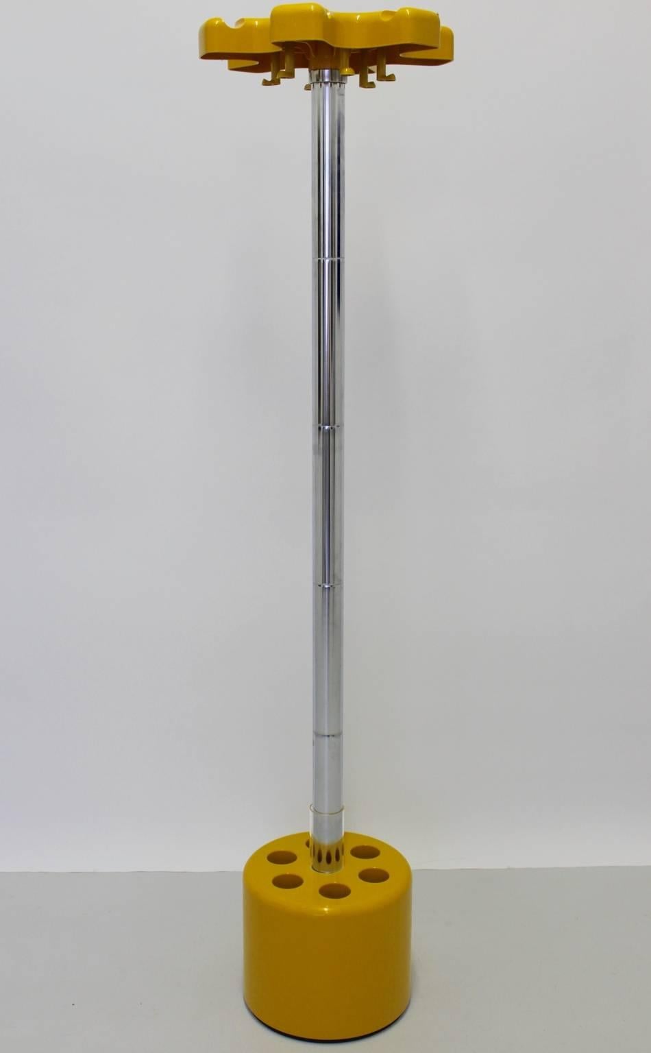 Space Age Coat Stand from chrome-plated steel and yellow plastic by Lucchi and Orlandini circa 1970, Italy.
The Designers are Roberto Lucchi and Paolo Orlandini circa 1970 and produced by Velca, Legnano, Milano.

The stem features parts, which are