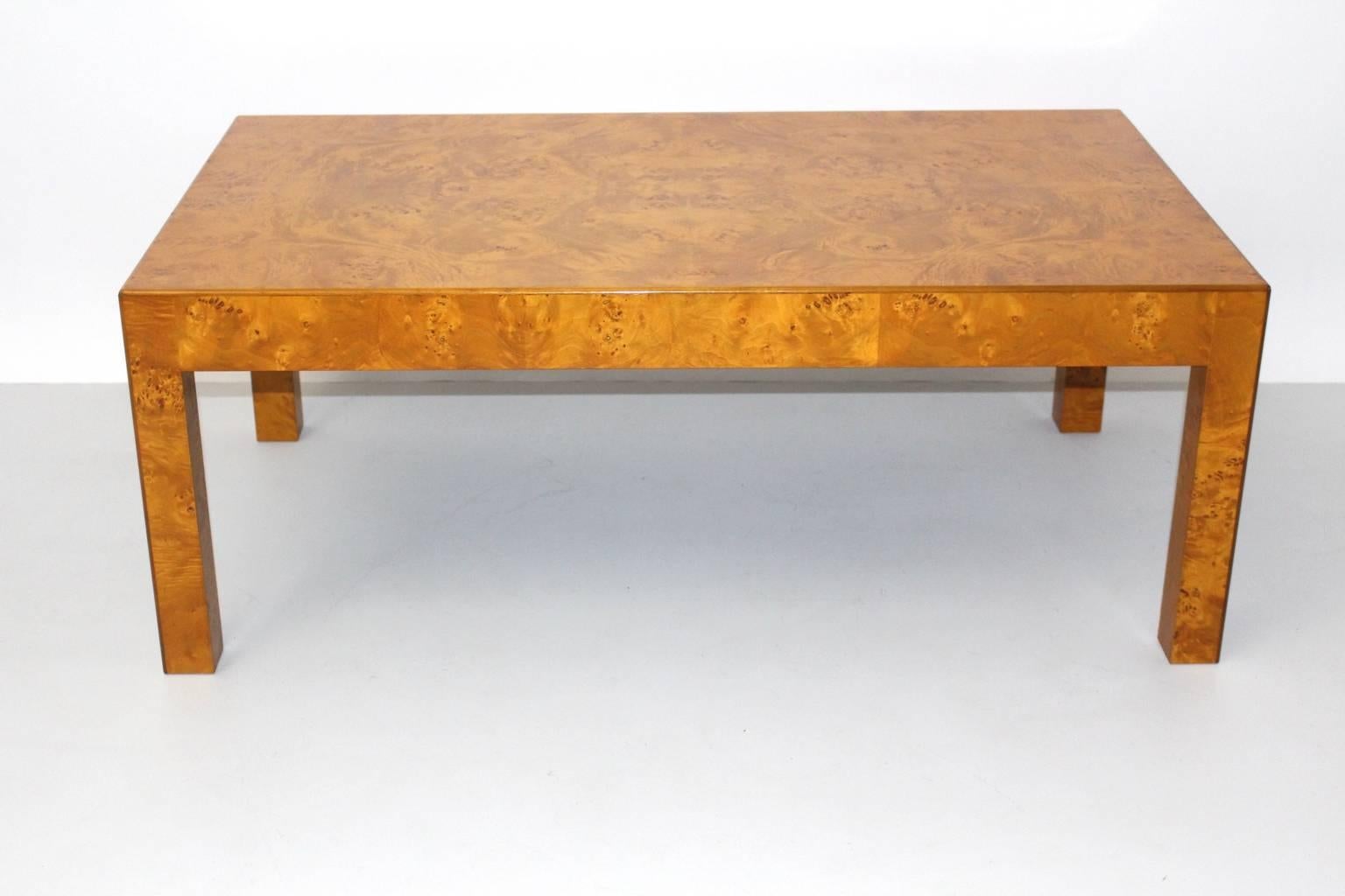 A modernist ash vintage coffee table, which features simple and great design features in the style of Milo Baughman.

Also the coffee table is veneered with ash wood root and shows a very good vintage condition with signs of age and use.
All