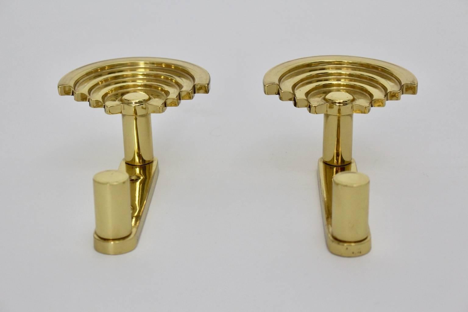 This pair of coat hooks Quattro SE 314 designed by Ettore Sottsass Associati and manufactured by Valli & Valli circa 1985 are very rare.
The coat hooks were made of solid polished brass and are in best condition.
These coat hooks, which are shaped