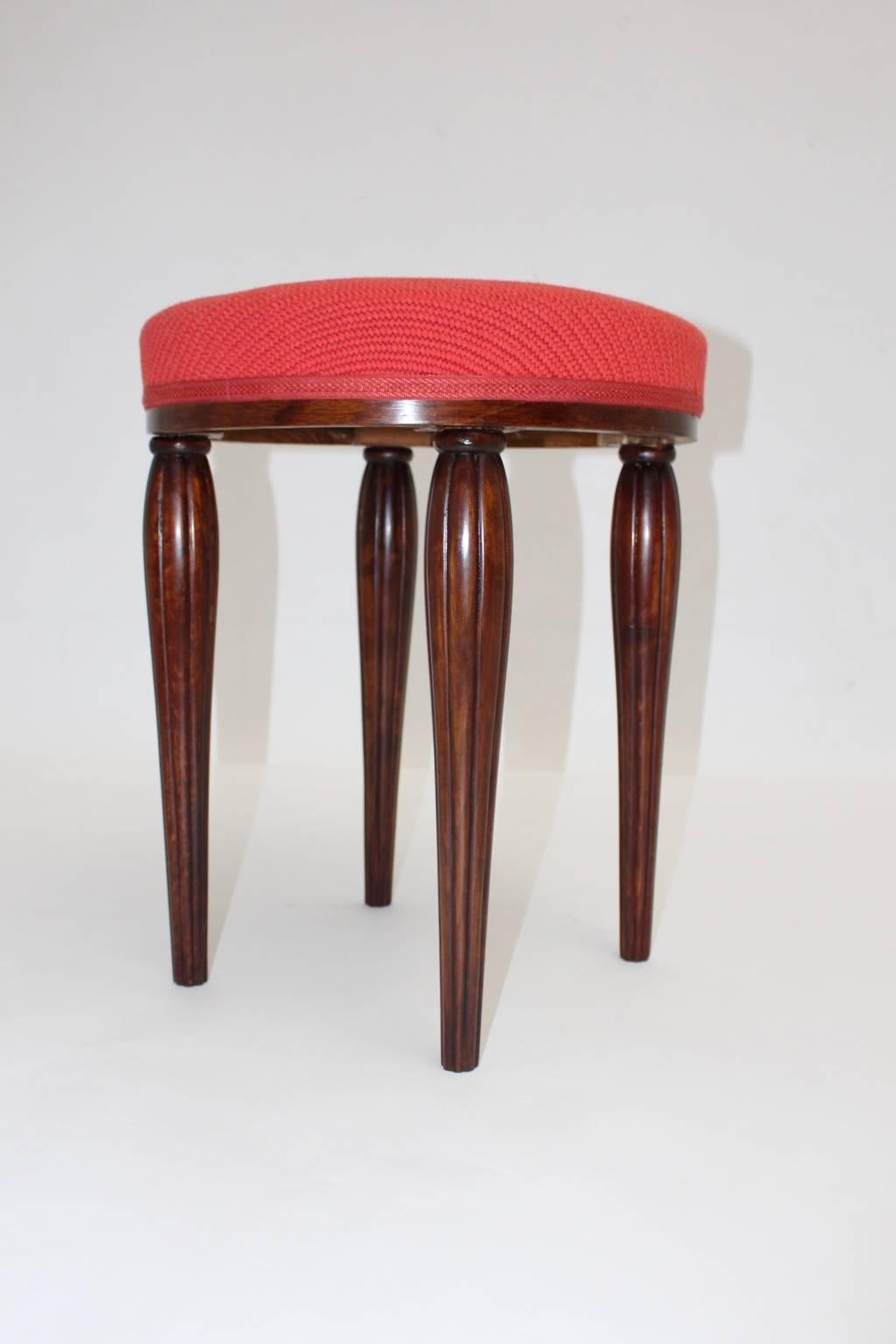 Red Stool or ottoman Vienna Secession attributed to Otto Prutscher Austria circa 1914.
The stool has grooved walnut feet and taper downwards.
The seat is newly covered with a high-quality textile fabric, carefully cleaned and polished by hand.
So