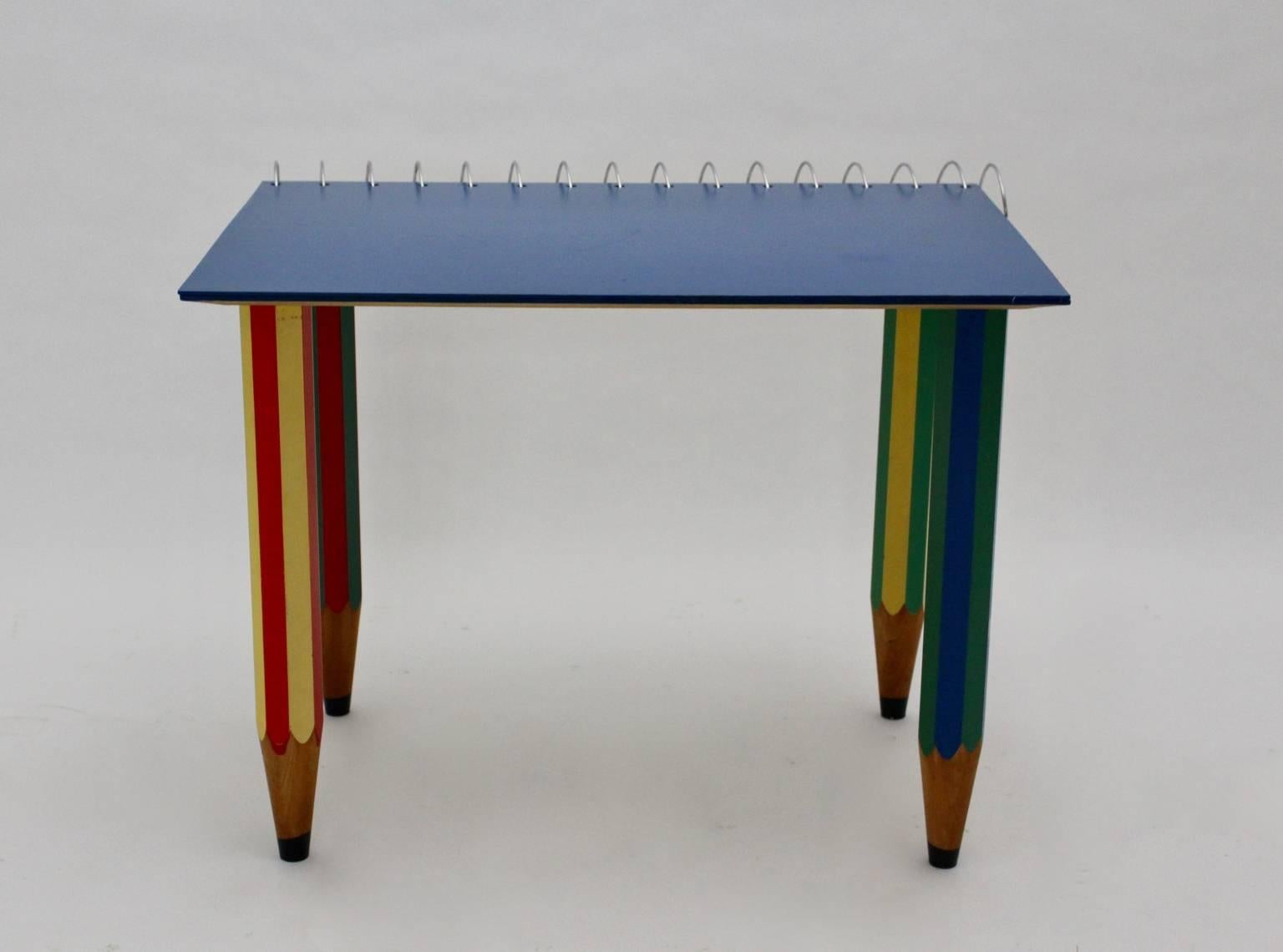 Pop art desk in different colors like blue, yellow and red designed by Pierre Sala ( 1948 - 1989 ) and executed by Pierre Sala Furniture, 1983.
It has feet made of spruce in different colors and shaped like pencils.
The blue colored top is foldable