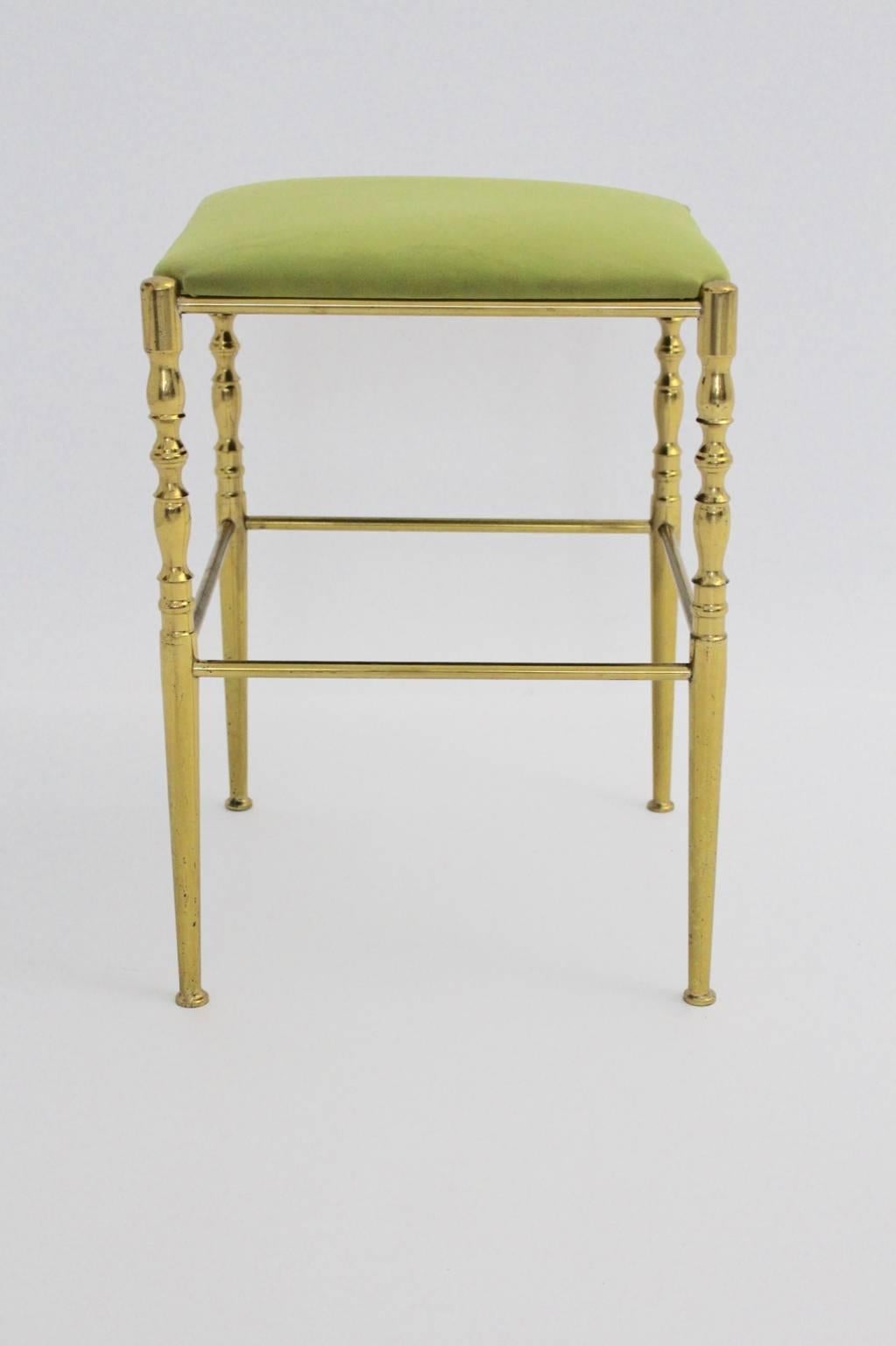 This brass stool features an upholstered seat with a new covering with grass green velvet fabric.
The stool was designed in the 1950s by Chiavari, Italy.
The vintage condition is very good with wonderful brass patina.
all measures are approximate