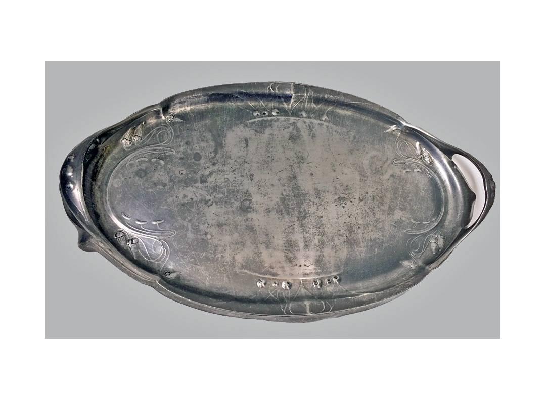 Art Nouveau Kayserzinn pewter tray, Germany, circa 1900. The two handled Tray stylized foliate design. Stamped No 4409 Kayserzinn Measures: Approximately 19 x 11.25 x 2.5 inches.