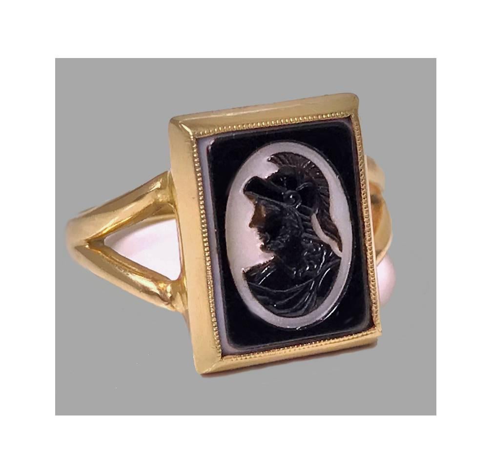 Antique 14-karat hardstone intaglio ring, circa 1900. The ring depicting Roman profile facing sinister. Bezel milligraine set surround, split plain shank, stamped 14K. Ring Size: 10.5 (may be sized). Total item weight: 6.43 grams.