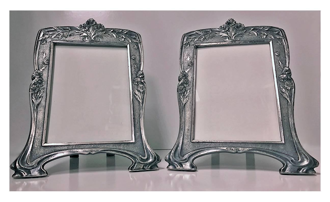 Rare Christofle Art Nouveau pair of photograph frames, circa 1900. Each with Christofle marks for Alfenide Gallia, a profile of a goat inside a rhombus in a square box and coat of arms with a Gallic cock and model numbers 4430. These frames are rare