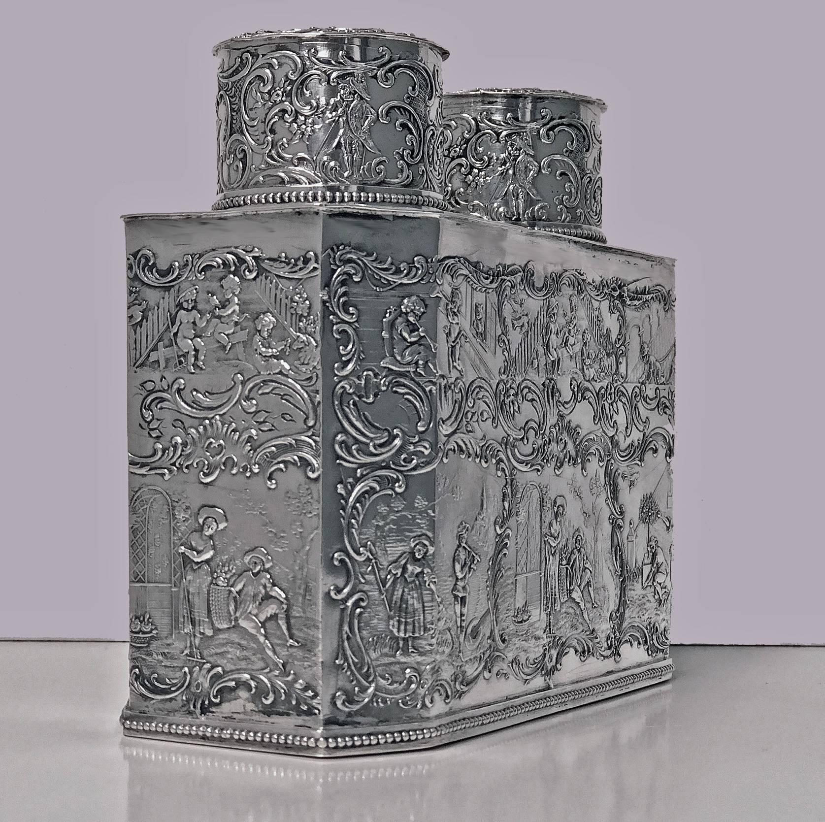 Very rare 19th century double compartment silver tea caddy, Germany, circa 1890. The tea caddy of rectangular octagonal form depicting musical ballad pastoral scenes of figures and cherubs and animals. The pull off cover tops reveals a divided