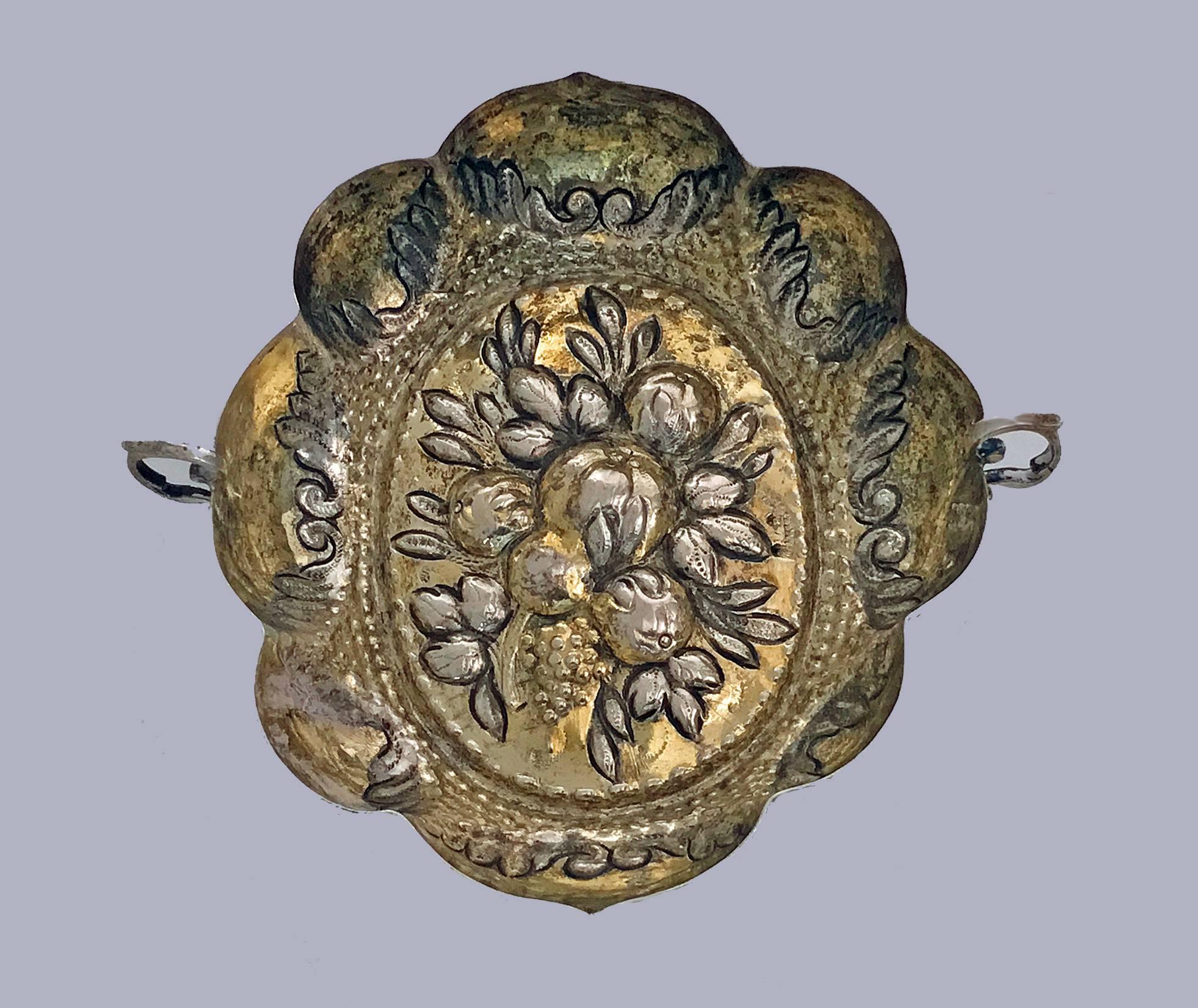 German 17th century parcel-gilt Sweetmeat Dish, Augsburg, circa 1670, Balthasar Haydt. Shaped oval and embossed with central foliage, cast side handles. Original interior gilding and gilt top on the outside. Weight: 87.25 grams. Measures: Height 3