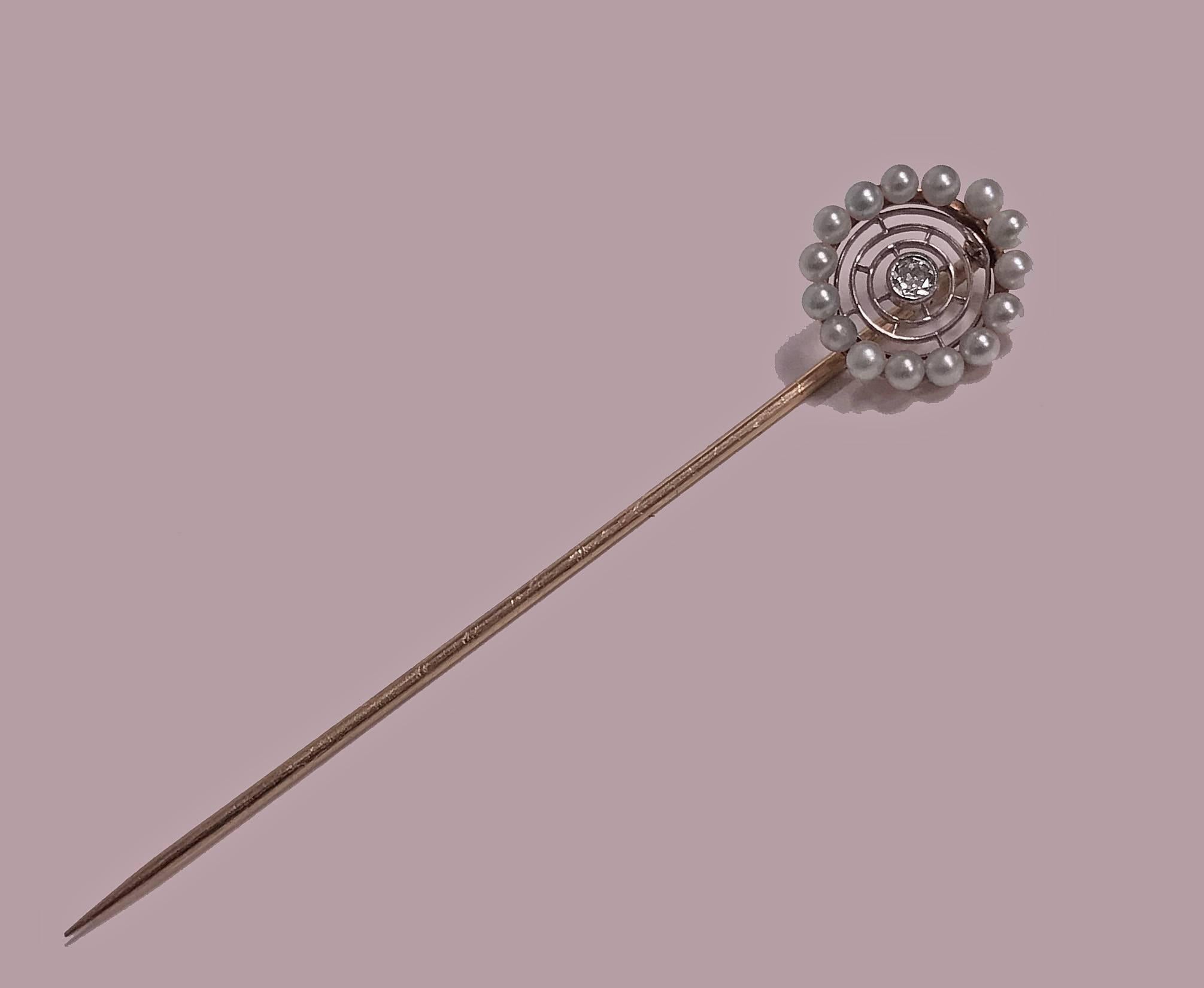 Antique Hans Brassler diamond, pearl, gold and platinum stickpin, American, circa 1900. The stickpin of a spider web design, set in the centre with an old cut diamond, approximately 0.07 carat and a surround of 15 round pearls (untested for