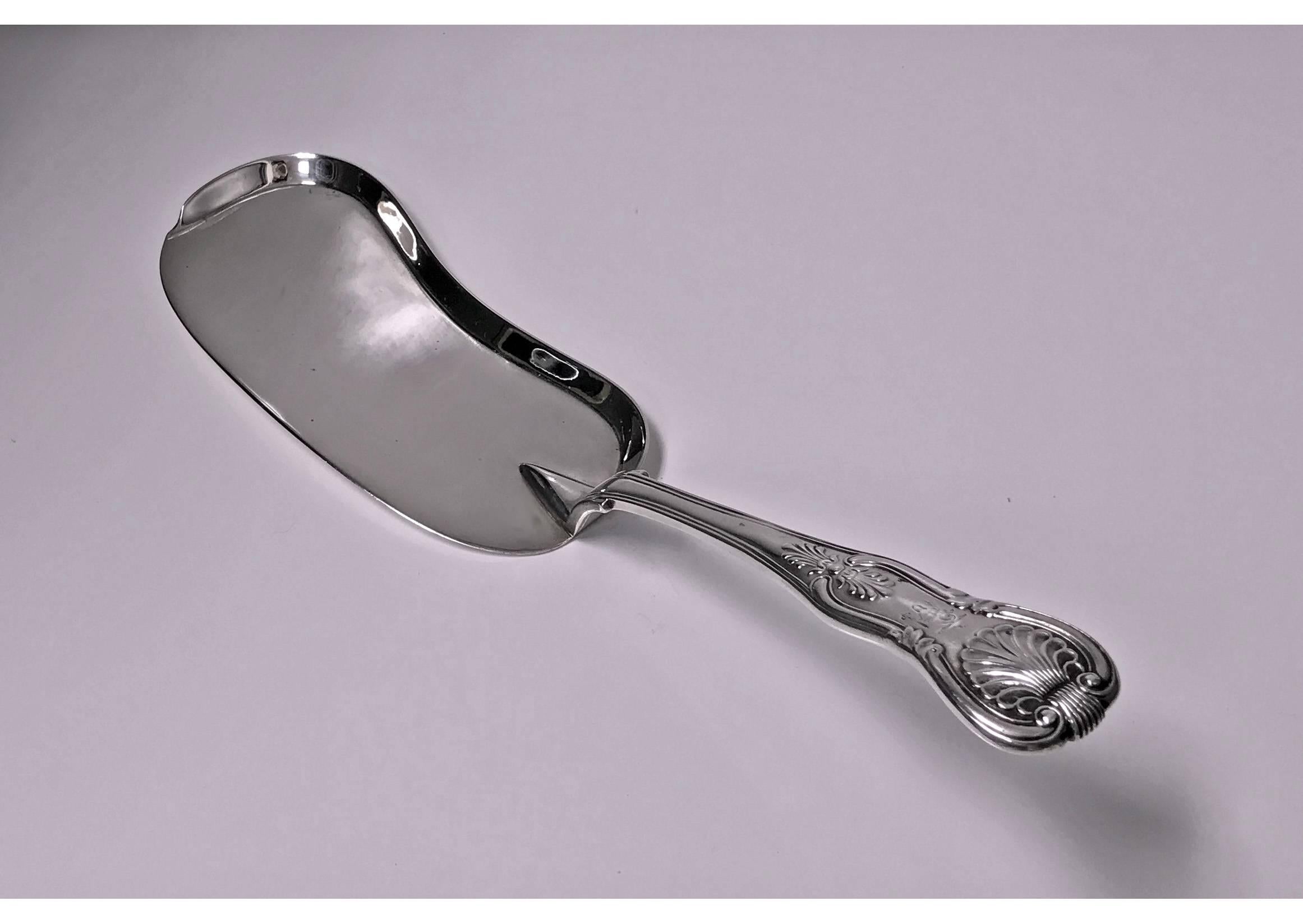 Rare Irish silver Slice or Crumb Scoop, Dublin, 1855, John Smyth. The Crumber of Kings pattern, engraved crest of a mermaid holding a sword and sceptre. Measure: Length 13 inches. Weight 9.75 oz.