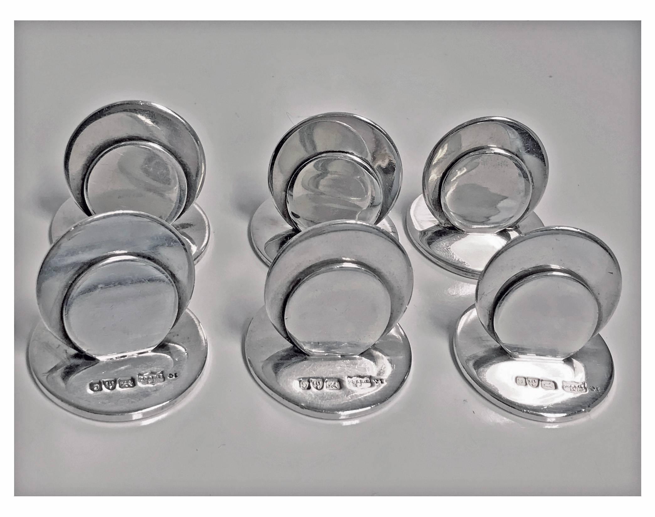 Set of six antique silver menu place card holders, London 1903-5, Sampson Mordan Co. Each of a plain circular disc like base, surmounted with similar smaller and larger fitment holders for cards. Each fully hallmarked for Sampson Mordan Co with a