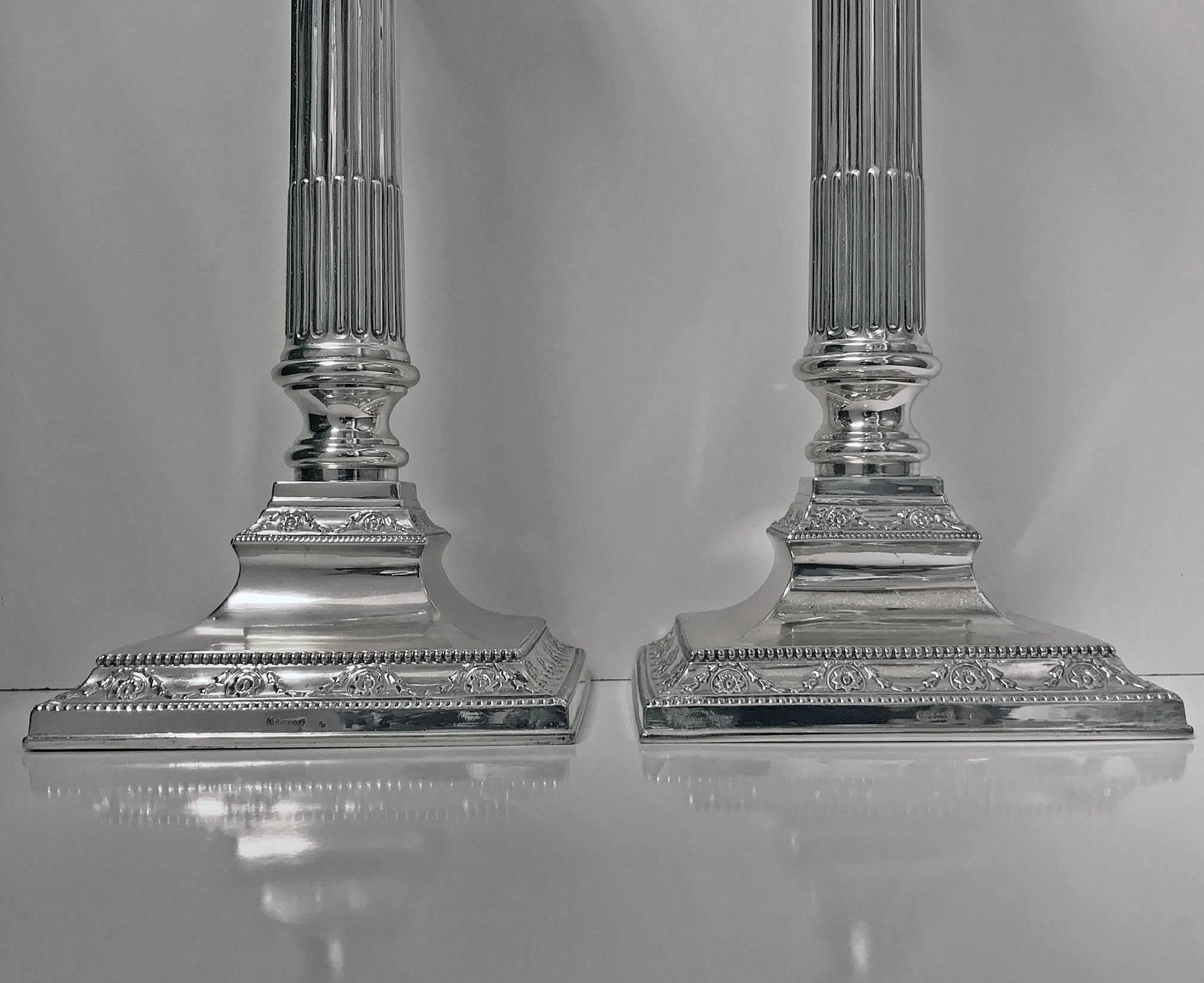 Pair of Antique Silver Candlesticks, Germany, circa 1900, H. Meyen & Co. The candlesticks of Corinthian column-form with bead festoon garland borders, column stems, and removable bead nozzles. Measure: Height 12.5 inches. Total weight 774 grams.